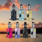 Seven colorful vape devices displayed against a sunset sky background