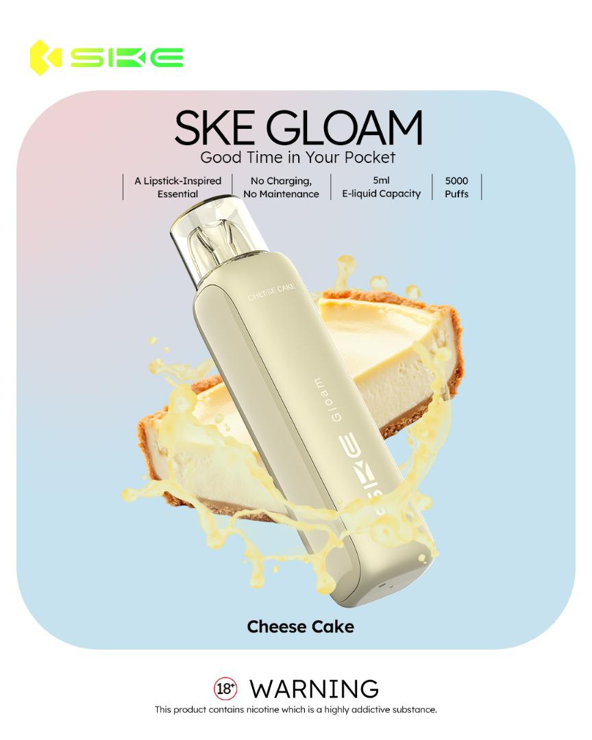 SKE Gloam vape device with cheesecake flavor on a gradient background